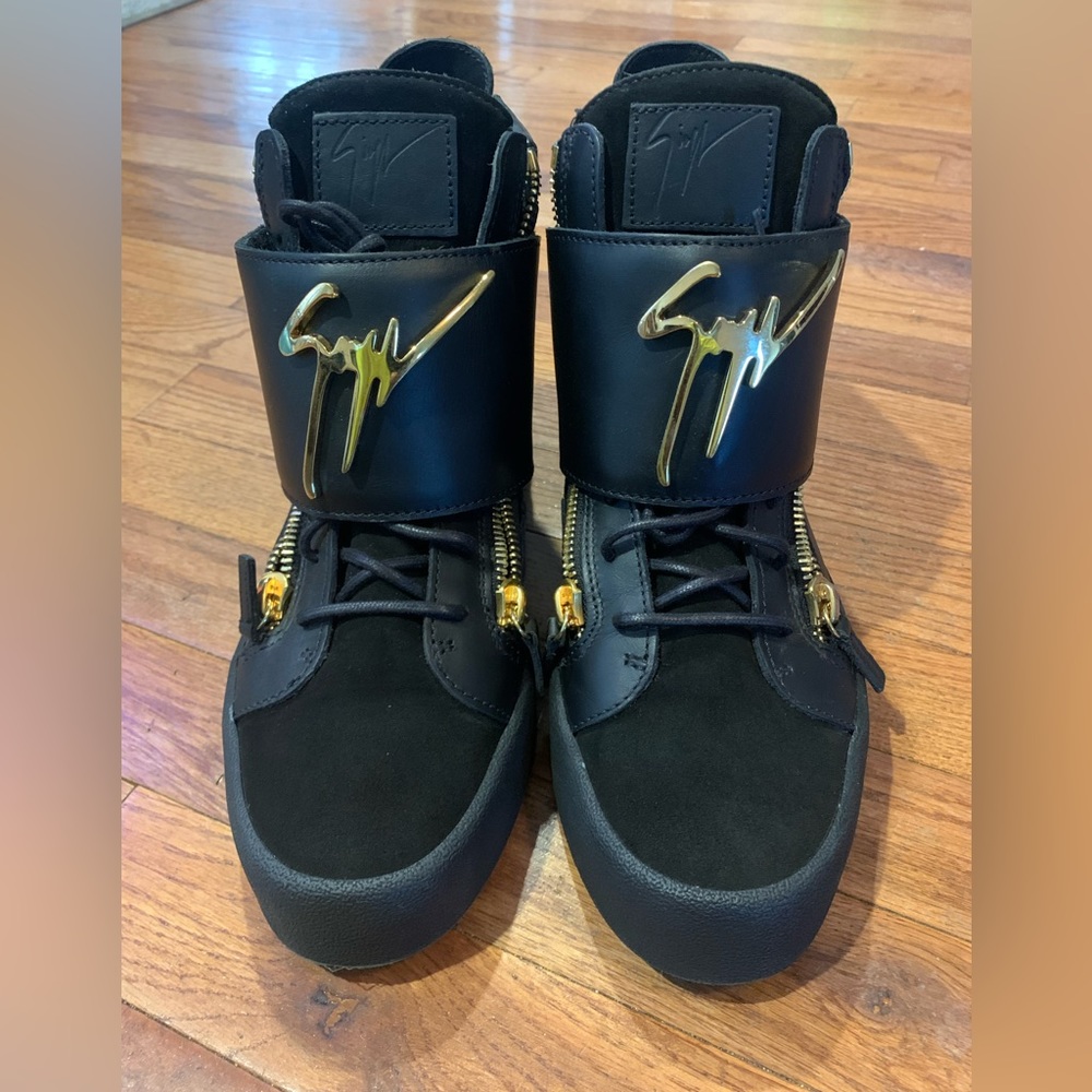 Giuseppe Zanotti High top sneakers with gold zippers.